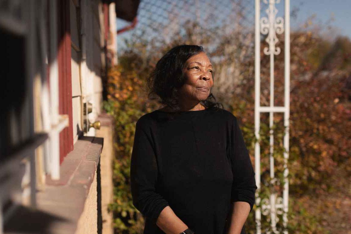 Photo of Ruby Johnson outside of her home